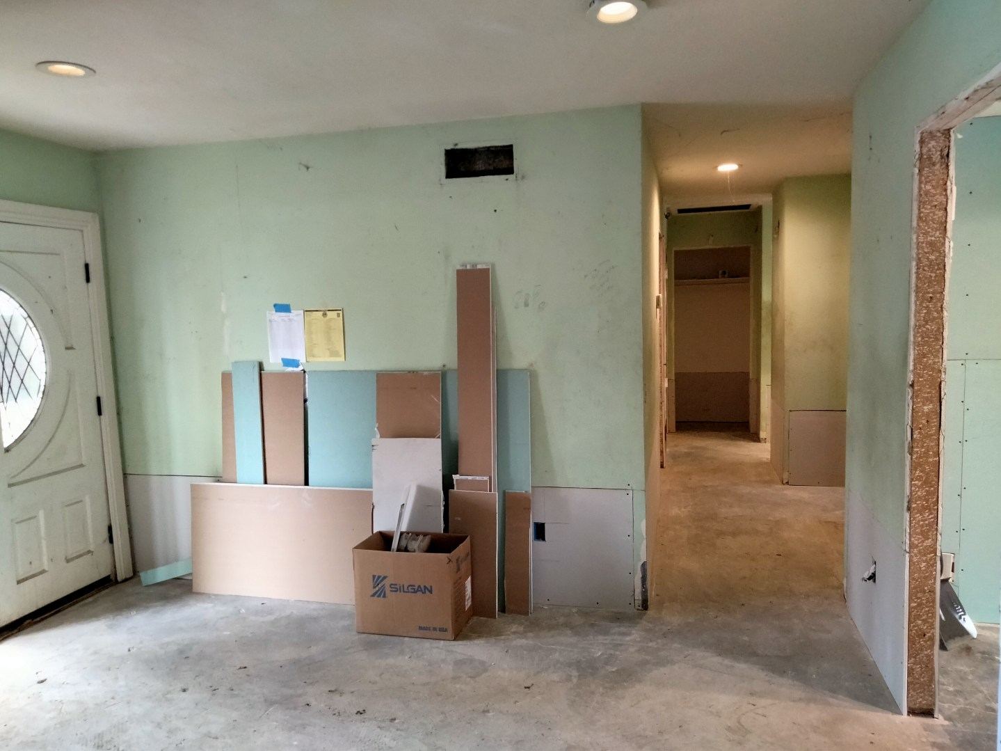 Briar Avenue living / entry during rehabilitation