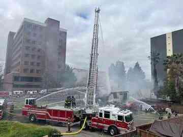 Firefighters battle the March 2024 blaze involving the two Victorian homes on North Fourth Street