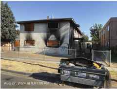 Tyler Avenue fire-damaged exterior before receivership