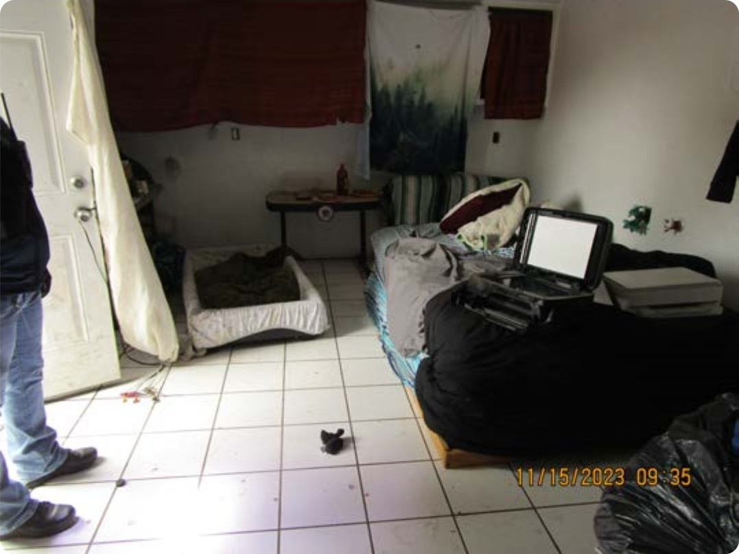 Tyler Avenue occupied living area before receivership rehabilitation